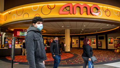 Movie fans visiting an AMC movie theater.