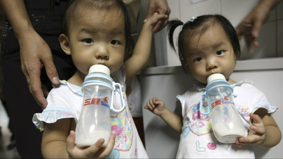 At least 300,000 children in China have been poisoned by tainted baby-formula. Six have died.