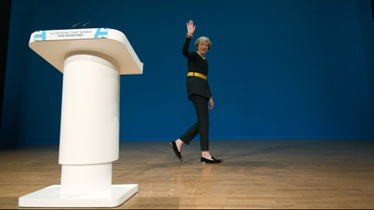 Britain's Prime Minister Theresa May's walks off stage after speaking at the annual Conservative Party Conference in Birmingham, Britain, October 2, 2016.