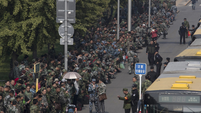 Chinese military veterans protest outside the defense ministry in Beijing