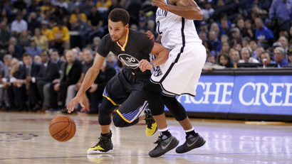 Nov 14, 2015; Oakland, CA, USA; Golden State Warriors guard Stephen Curry (30) dribbles past Brooklyn Nets guard Jarrett Jack (2) in the first quarter at Oracle Arena.