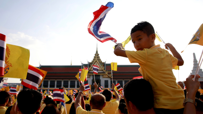 Bangkok cheers a new Thai king.