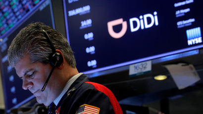 A trader works during the IPO for Chinese ride-hailing company Didi Global Inc on the New York Stock Exchange (NYSE) floor in New York City, U.S., June 30, 2021.