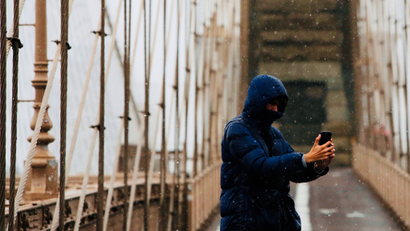 Cellphone on the Brooklyn Bridge.
