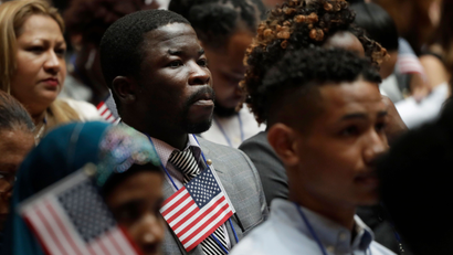 An unidentified man listens during a US naturalization ceremony