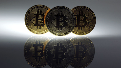 Mock bitcoins on a table