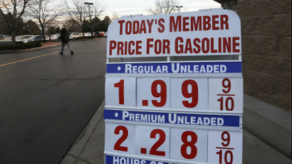 A price sign outside a Costco shows gas selling below $2.00 US for the first time in years, in Westminster Colorado December 16, 2014.