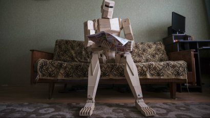 Robot with newspaper