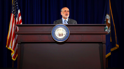 U.S. Federal Reserve Board Chairman Ben Bernanke holds a news conference following the Fed's two-day Federal Open Market Committee (FOMC) meeting in Washington September 18, 2013. The Fed said on Wednesday that it would continue buying bonds at an $85 billion monthly pace for now, expressing concerns that a sharp rise in borrowing costs in recent months could weigh on the economy.