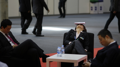 A conference member taking a nap