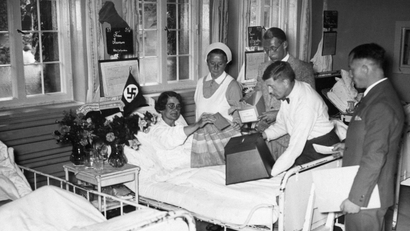 woman voting for hitler in hospital bed
