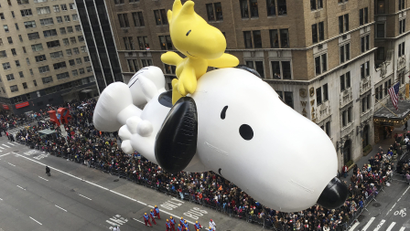 A float depicting the animated "Peanuts" characters Snoopy and Woodstock