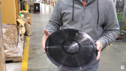 Man hold Vinyl in Factory