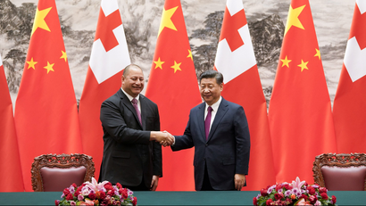 King Tupou VI (L) of Tonga shakes hands with Chinese President Xi Jinping (R) after a signing ceremonyat The Great Hall Of The People, in Beijing, China, March 1, 2018.