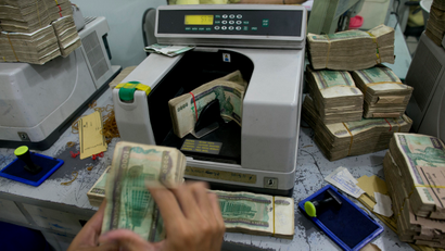 Bank teller in Myanmar