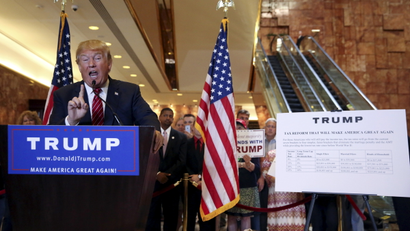 U.S. Republican presidential candidate Donald Trump speaks during a news conference to reveal his tax policy at Trump Tower in Manhattan, New York September 28, 2015.