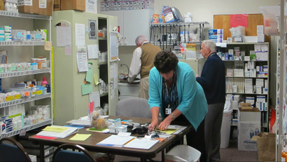 Volunteers work in the pharmacy at the Volunteers in Medicine Clinic on Hilton Head Island, South Carolina.