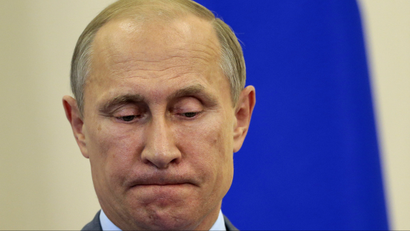 Vladimir Putin considers a question in Sochi on Aug. 15, 2014.