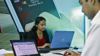 Employees work on their laptops at the Start-up Village in Kinfra High Tech Park in Kochi