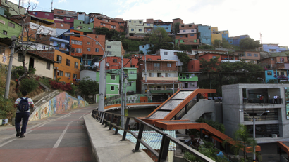A man walks in the "Comuna 13" neighborhood in Medellin