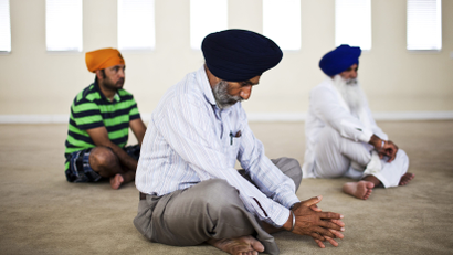 Randhir Singh prays at the Sikh Temple Gurdwara Sri Sachkand Sahib in Roseville, California