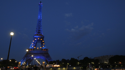The Eiffel Tower in Paris is lighted up as France marks the start of its six-month presidency of the European Union