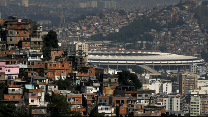 The Maracana stadium is seen between Turano slum (L) and Mangueira slum, in Rio de Janeiro.