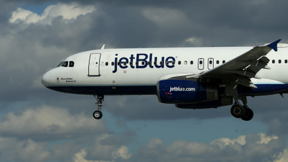 A JetBlue aircraft comes in to land at Long Beach Airport