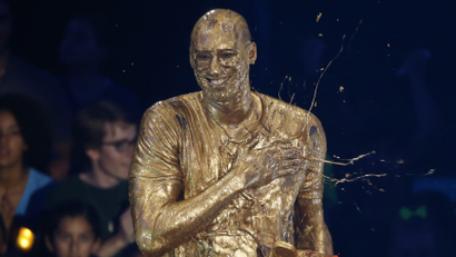 Retired NBA basketball player Kobe Bryant reacts after he was "slimed" after accepting the "Legend" award at the Kids Choice Sport 2016 awards in Los Angeles, California U.S., July 14, 2016. REUTERS/Mario Anzuoni - RTSI0EV