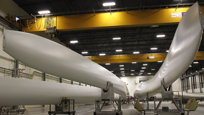 Wind turbine blades are displayed at TPI Composites in Newton, Iowa December 22, 2011. TPI Composites manufacture blades for Mitsubishi and GE.