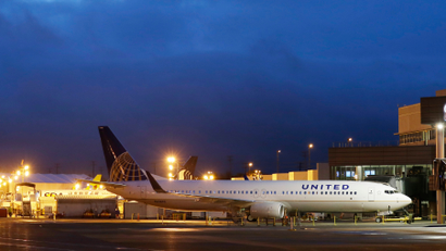 A new Boeing 737-900ER airplane being delivered to United Airlines is parked in front of Boeing's newly expanded 737 delivery center, Monday, Oct. 19, 2015, at Boeing Field in Seattle. The center will be the main delivery point for various configurations of the 737 single-aisle airplanes to customers and is double the size of the previous building. (AP Photo/Ted S. Warren)