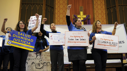 A coalition of women's groups participate in a rally supporting immigration reform on Monday, March 18, the day of Karen Panetta's Senate hearing.