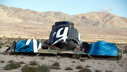 A piece of debris is seen near the crash site of Virgin Galactic's SpaceShipTwo near Cantil, California November 1, 2014. Virgin Galactic founder Richard Branson said on Saturday he was working with U.S. authorities to determine what caused a passenger spaceship being developed by his space tourism company to crash in California, killing one pilot and injuring the other.