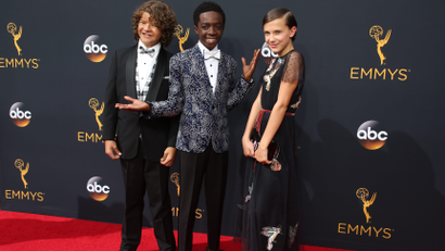 Actors Gaten Matarazzo, Caleb McLaughlin and Millie Bobby Brown from the Netflix series "Stranger Things" arrive at the 68th Primetime Emmy Awards in Los Angeles, California