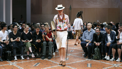 A model presents a creation by Japanese designer Junya Watanabe during the men's Spring Summer collection fashion shows in Paris on June 26, 2015.