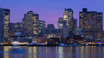 The city skyline is seen at dusk on Boston Harbor in Boston, Friday, Jan. 6, 2012.