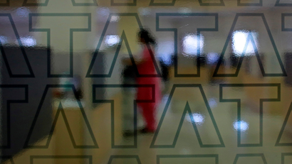 An employee of Tata Consultancy Services (TCS) works inside the company headquarters in Mumbai