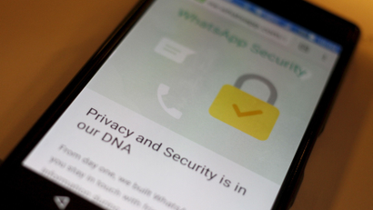 A security message is seen on a Whatsapp screen in this illustration photo