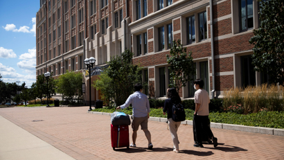 Students move back into the dorm for fall semester.