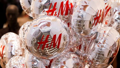 Balloons with the logo of Swedish fashion retailer Hennes &amp; Mauritz (H&amp;M) are pictured at its newly opened store in central Moscow, Russia, May 27, 2017. REUTERS/Maxim Shemetov/File Photo - RC1BC8221F10