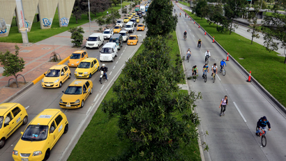 Cars cause traffic jams while bikes move freely