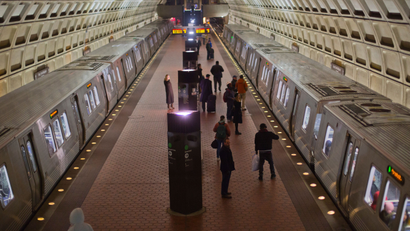 Passengers board subway trains at the Naval Yard-Ballpark Metro Station, Thursday, Feb. 8, 2018, part of the public transit network for Washington. (AP Photo/Pablo Martinez Monsivais)