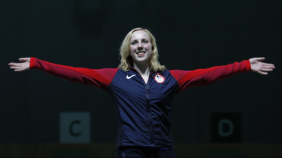 Virginia Thrasher of the United States celebrates winning the gold medal during the victory ceremony for the Women's 10m Air Rifle event, at Olympic Shooting Center at the 2016 Summer Olympics in Rio de Janeiro, Brazil, Saturday, Aug. 6, 2016.
