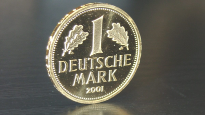 A 2001 special gold issue of the DM 1 coin.
