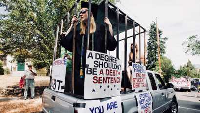 Protesting against high student loan burdens at the annual July 4th parade at Ashland, Oregon.