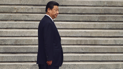 China's President Xi Jinping on some steps.