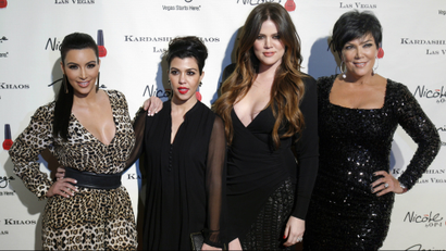 Television personalities (L-R) Kim Kardashian, Kourtney Kardashian, Khloe Kardashian and Kris Jenner arrive at the grand opening of the Kardashian Khaos store at the Mirage Hotel and Casino in Las Vegas, Nevada December 15, 2011.