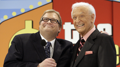 The Price is Right show host, comedian Drew Carey, left, shares a moment with longtime host Bob Barke