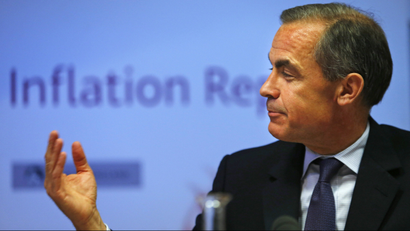 Bank of England governor Mark Carney gestures during a news conference