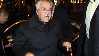 Saudi Arabian Oil Minister Ali al-Naimi gestures as he arrives at his hotel ahead of an OPEC meeting in Vienna December 2, 2013.
